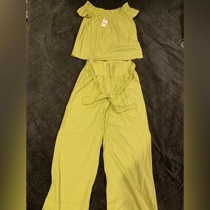 Free People 2 piece set. NWT. Flattering. Top can be worn off shoulder or on.